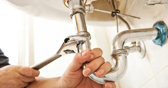 Repairing the pipes of a sink